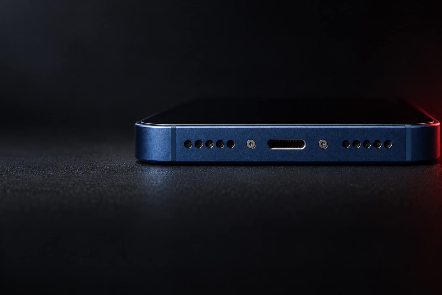 Bottom edge of a blue iPhone 12 showing the Lightning charging port and speaker grilles